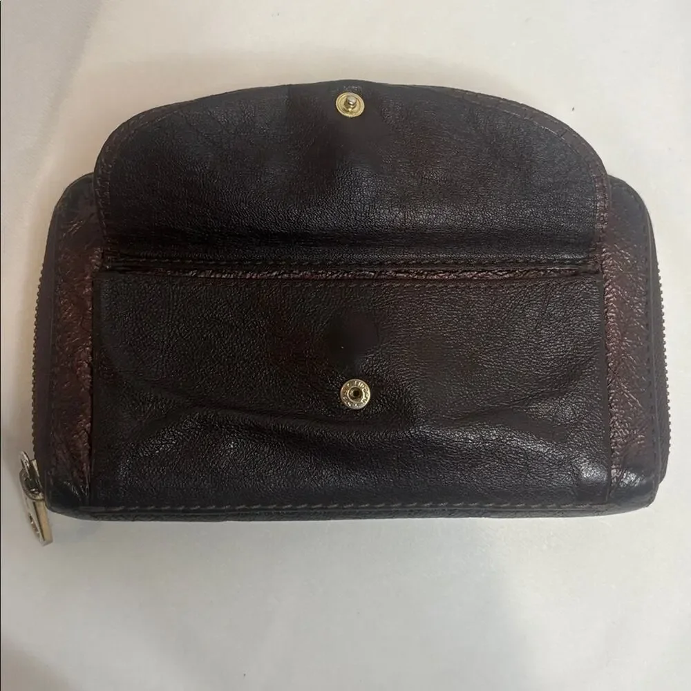 Chloe Lilly bow front long wallet in a metallic maroon brown